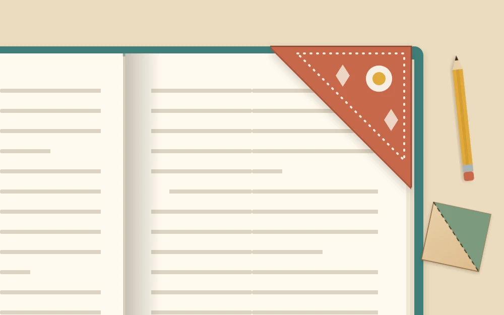 Triangular cardboard corner bookmark slipped over the top corner of a page in an open book