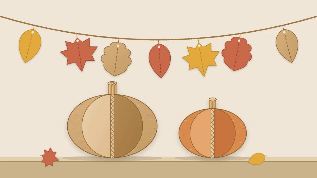 Garland of cardboard leaves in mustard, terracotta and kraft brown strung on twine above two round slotted cardboard pumpkins