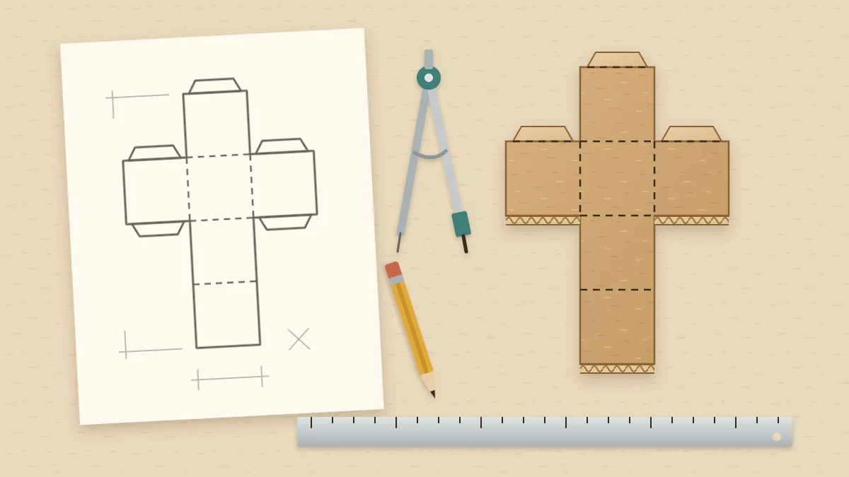 A hand-drawn box net on a sheet of paper next to the same net cut from cardboard, with a pencil, ruler and compass