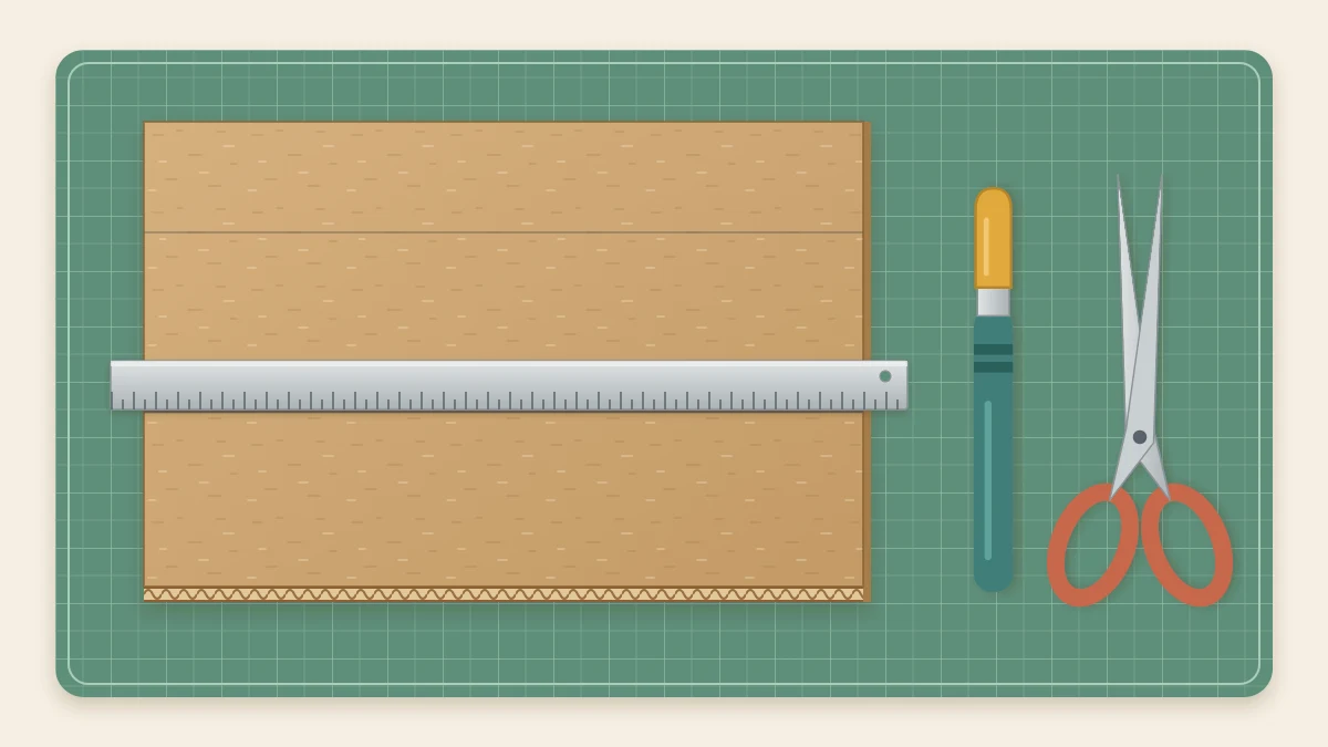 Corrugated cardboard sheet on a green cutting mat with a metal ruler along a pencil line, a capped craft knife and scissors